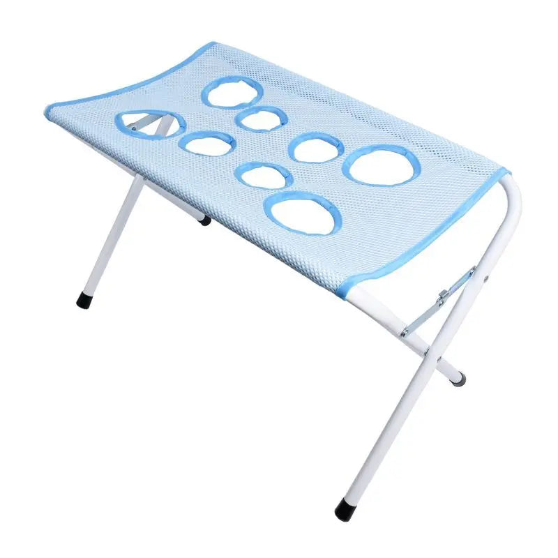 Pet grooming hammock stand shown from the side in blue